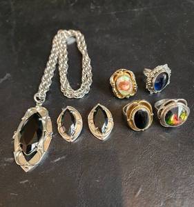 lot 610 image: Necklace, Earrings, and (4) Rings (all are Whiting & Davis)