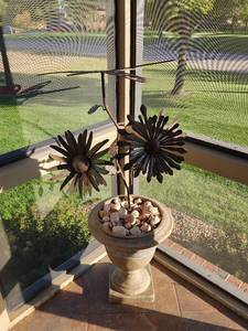 lot 812 image: Concrete Flowerpot with Metal Silverware Art and Seashells 45.5 Tall