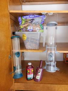 lot 829 image: Bird Feed, Bird Feeders, and Bird House