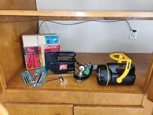 lot 841 image: Reese 2 12 Drop Hitch with 2 Ball, Flashlight, and Sabre Saw