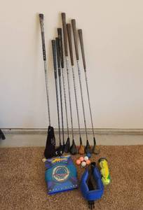 lot 858 image: Antique Wooden Golf Clubs and others, NIB Frisbee, and Golf Balls,