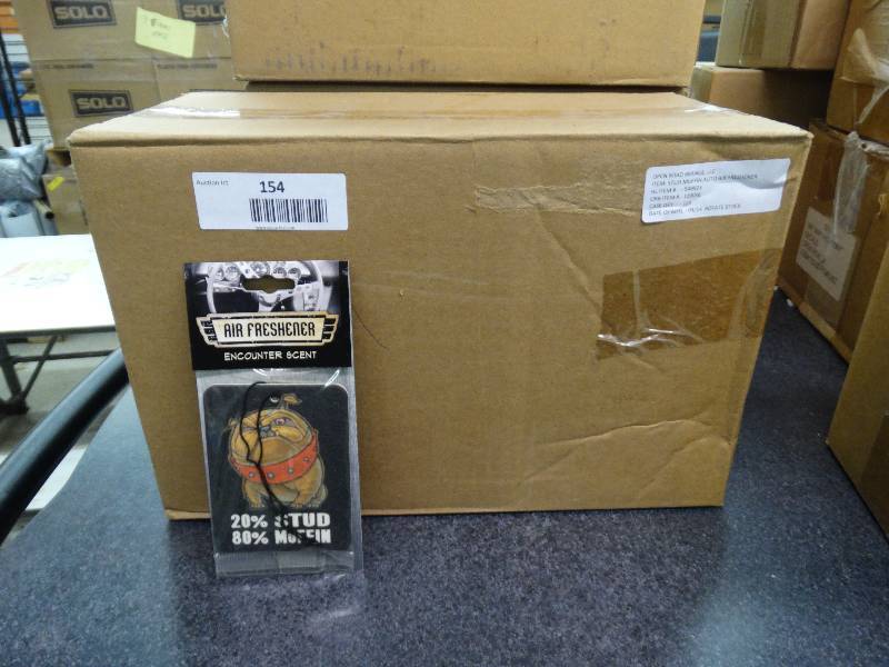lot 154 image: Case Of 125 Stud Muffin Auto Air Freshener.