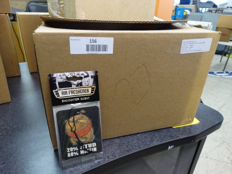 lot 156 image: Case Of 125 Stud Muffin Auto Air Freshener.