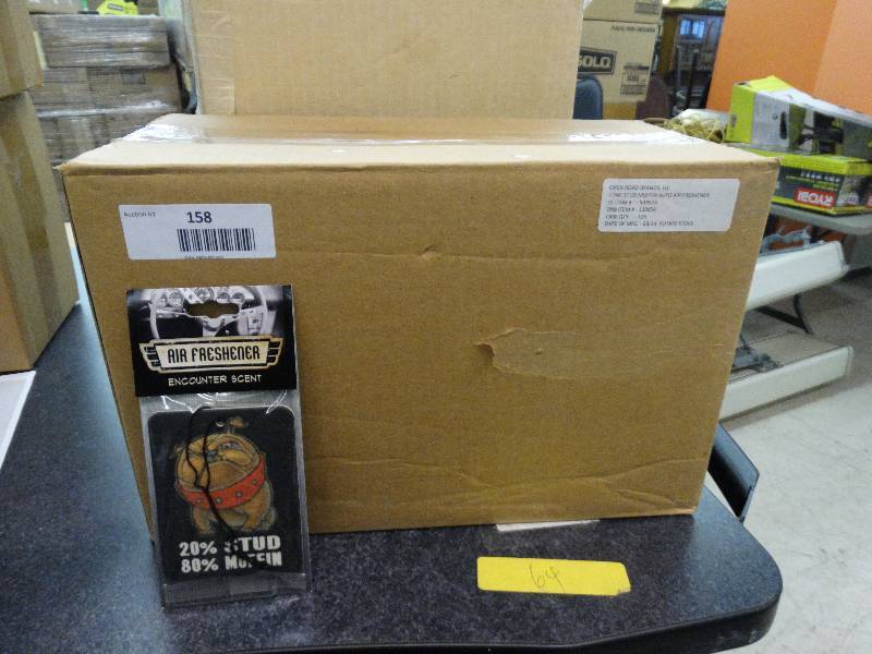 lot 158 image: Case Of 125 Stud Muffin Auto Air Freshener.