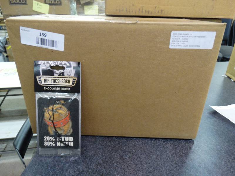 lot 159 image: Case Of 125 Stud Muffin Auto Air Freshener.