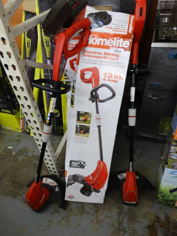 lot 194 image: 4 Homelite Electric String Trimmers.