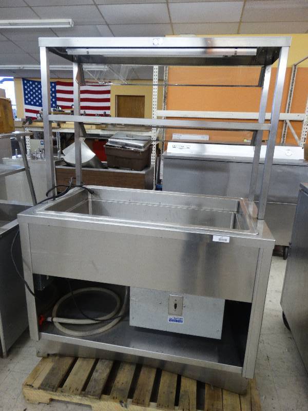 lot 207 image: Stainless Steel Refrigerated Salad Bar WSneeze Guard & Folding Tray In Front.