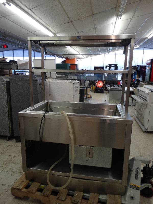 lot 210 image: Stainless Steel Refrigerated Salad Bar WSneeze Guard & Folding Tray In Front.
