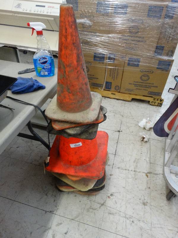 lot 244 image: Stack Of Various Size Safety Cones.