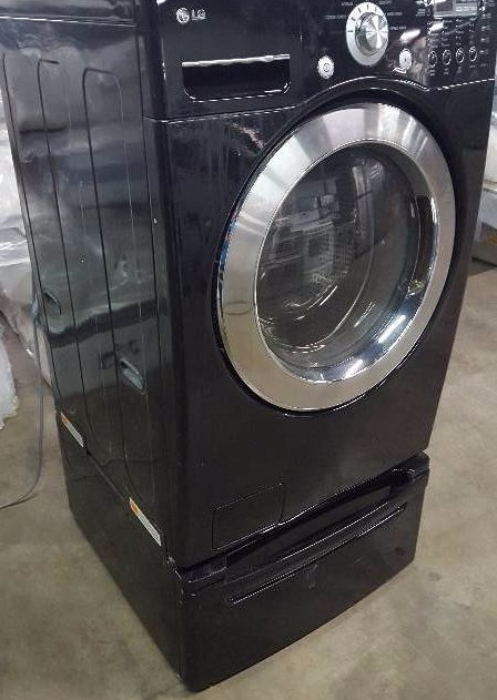 lot 174 image: LG Front load washing machine with storage bin on bottom