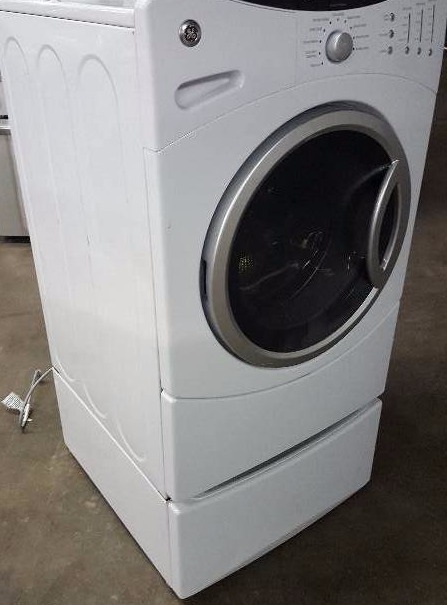 lot 178 image: GE Front load washing machine with storage bin on bottom