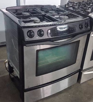 lot 191 image: Jenn Air 4 burner gas range with oven slide in