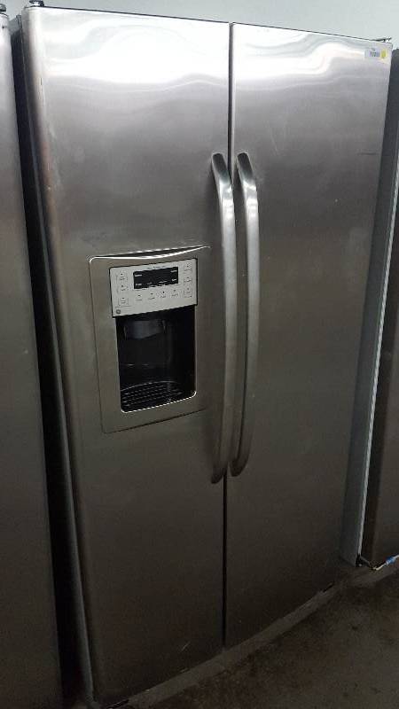 lot 211 image: GE 25.4 cu. ft. Side by Side Refrigerator in Stainless Steel