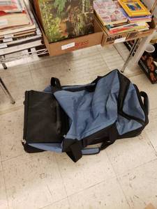 lot 8354 image: big duffle bag on wheels
