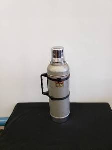 lot 8567 image: old Stanley thermos