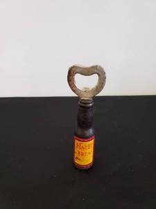 lot 8584 image: happy brew cast iron bottle opener