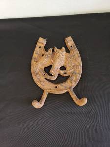 lot 8589 image: heavy metal horse hooks