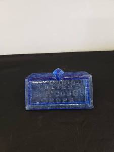 lot 8591 image: blue glass cough drops lid