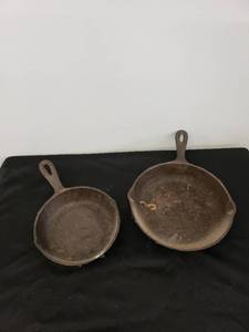 lot 8669 image: pair cast iron skillets