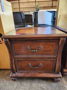 lot 39743 image: End Table With Dark Brown Finish