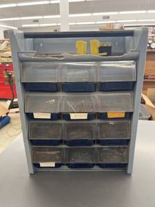 lot 9437 image: storage bin full of nails