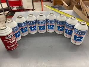 lot 9532 image: 9 cans of 12