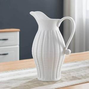 lot 2063 image: Genteel Charm Pitcher
