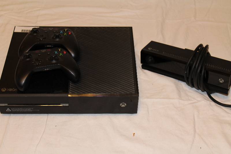 lot 1004 image: Xbox One with 2 Controllers