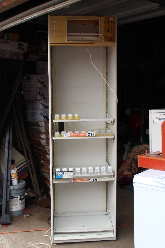 lot 1099 image: 4 Shelf Cigarette Merchandiser