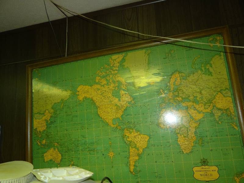 lot 1057 image: World Map In Picture Frame.