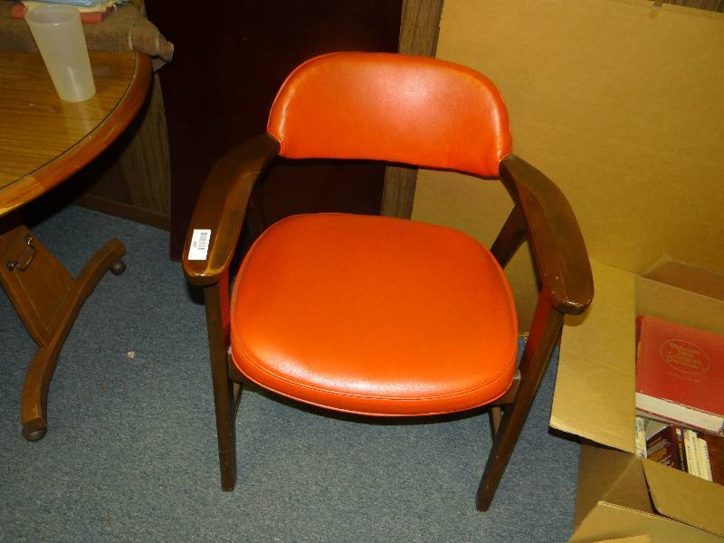 lot 1060 image: A Pair Of Orange Chairs.