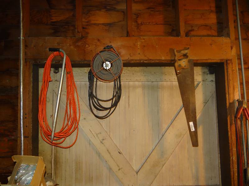 lot 1093 image: Hand Saw Poker 3 Extension Cords.