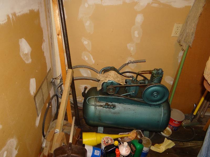 lot 1174 image: All Contents In Room - Unknown Hard Wired Compression Folding Chair, Chemical, Mops.