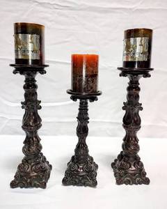 lot 15793 image: Ornate Pillar Candle Holders - Set of 3 - with Candles (2) 13 & (1) 10