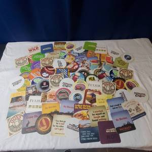 lot 2172 image: Unique Advertising Coasters Bundle