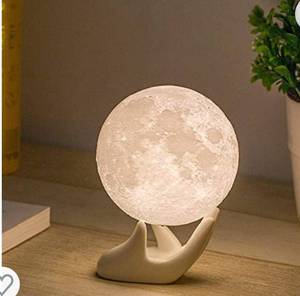 lot 85 image: Moonshaped table lamp, mydethun, night light for children, charged by usb, brightness touch control, two shades one warm and one cold white, great gift idea
