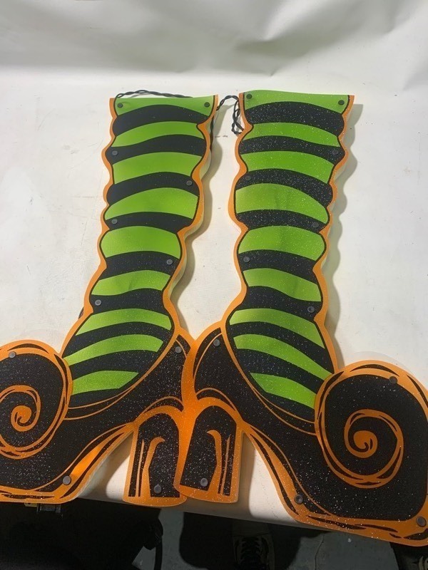 lot 216 image: New Pair of Halloween Impact Instant Decor 21 Light Up Witch Legs