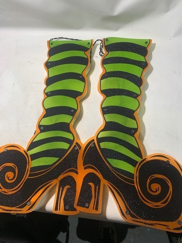 lot 217 image: New Pair of Halloween Impact Instant Decor 21 Light Up Witch Legs