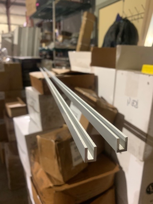 lot 661 image: 2 New Aluminum 38x72 U Bar Trim Pieces