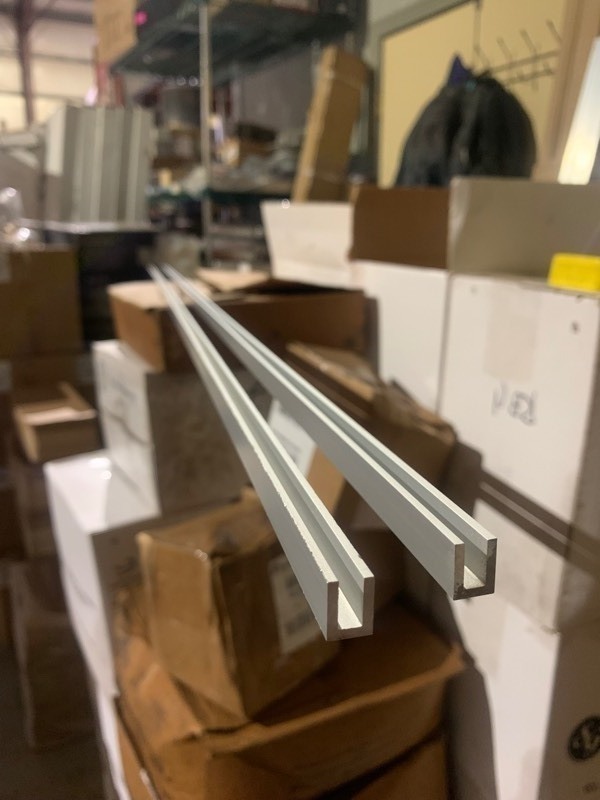 lot 662 image: 2 New Aluminum 38x72 U Bar Trim Pieces
