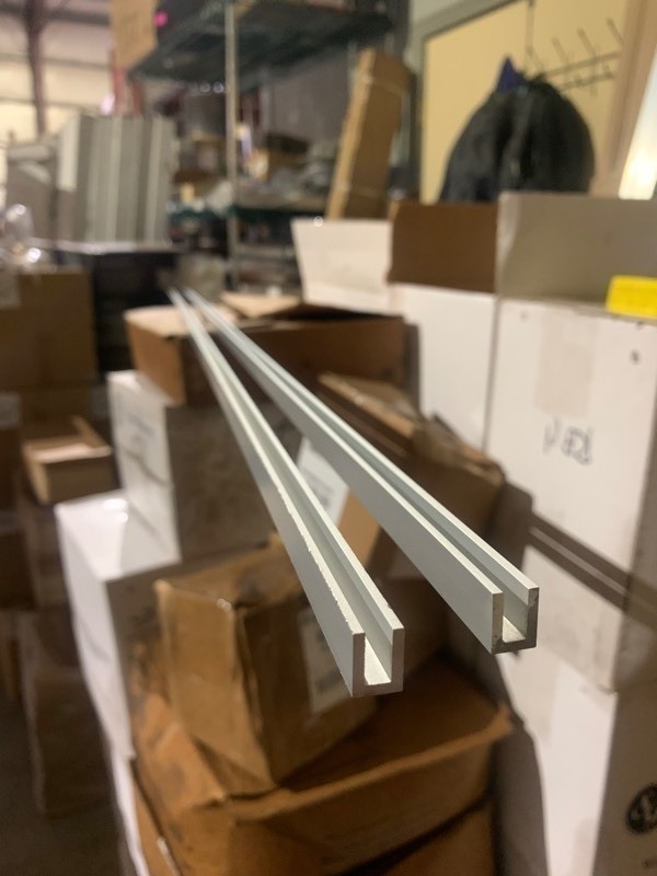 lot 663 image: 2 New Aluminum 38x72 U Bar Trim Pieces