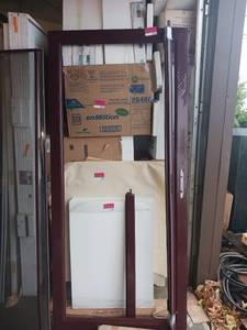 lot 5165 image: Maroon colored storm door
