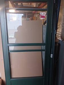 lot 5169 image: Green Storm Door