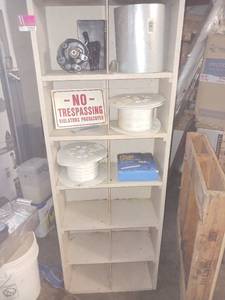 lot 5202 image: 6 Tier Cubby Shelf  contents included