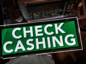 lot 5406 image: Check Cashing Sign - small chip