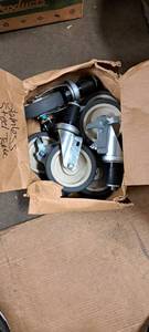 lot 5413 image: Lot of Stainless Steel Table Casters
