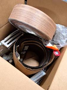 lot 7034 image: huge box of copier toners, hair dye, outside stainless instant hot water heater vent