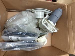 lot 7046 image: Box of high efficiency furnace outside exhaust flanges