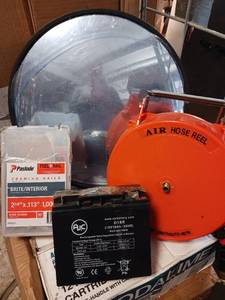 lot 5380 image: Lot of 4 items, Blind Spot Mirror, Air Hose Reel, AJC Battery with rechargeable valve, Framing Nails