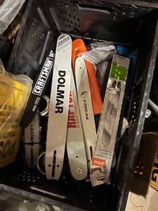 lot 4032 image: bin full of chainsaw stihl craftsman makers Oregon bars and chains. aluminum rulers, etc